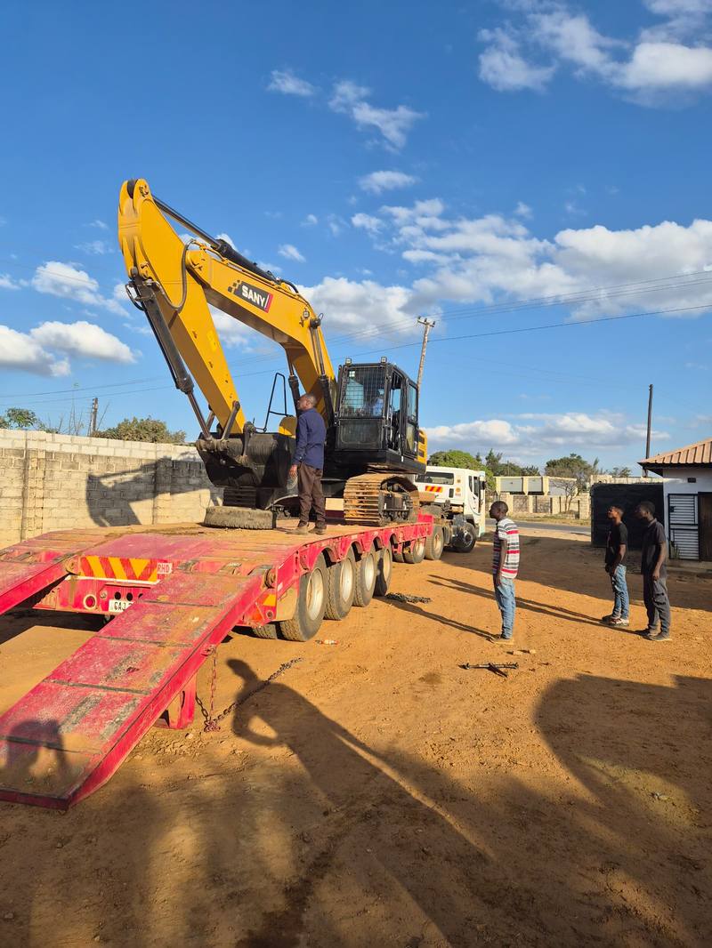 Low bed truck for heavy equipment transport in Zambia